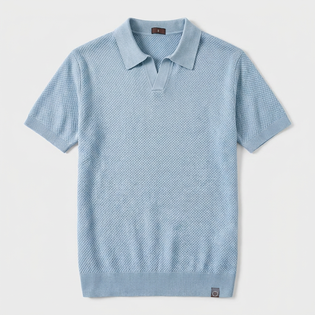 Navy knit polo flatlay